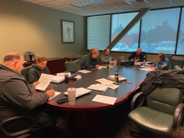 Handlers studying in class